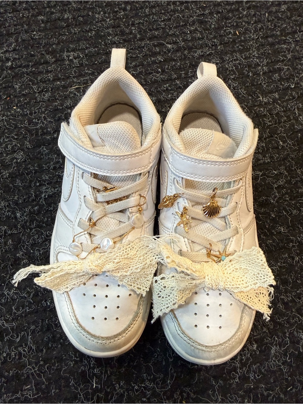 Nike Kids White Sneakers with Gold Charm Details